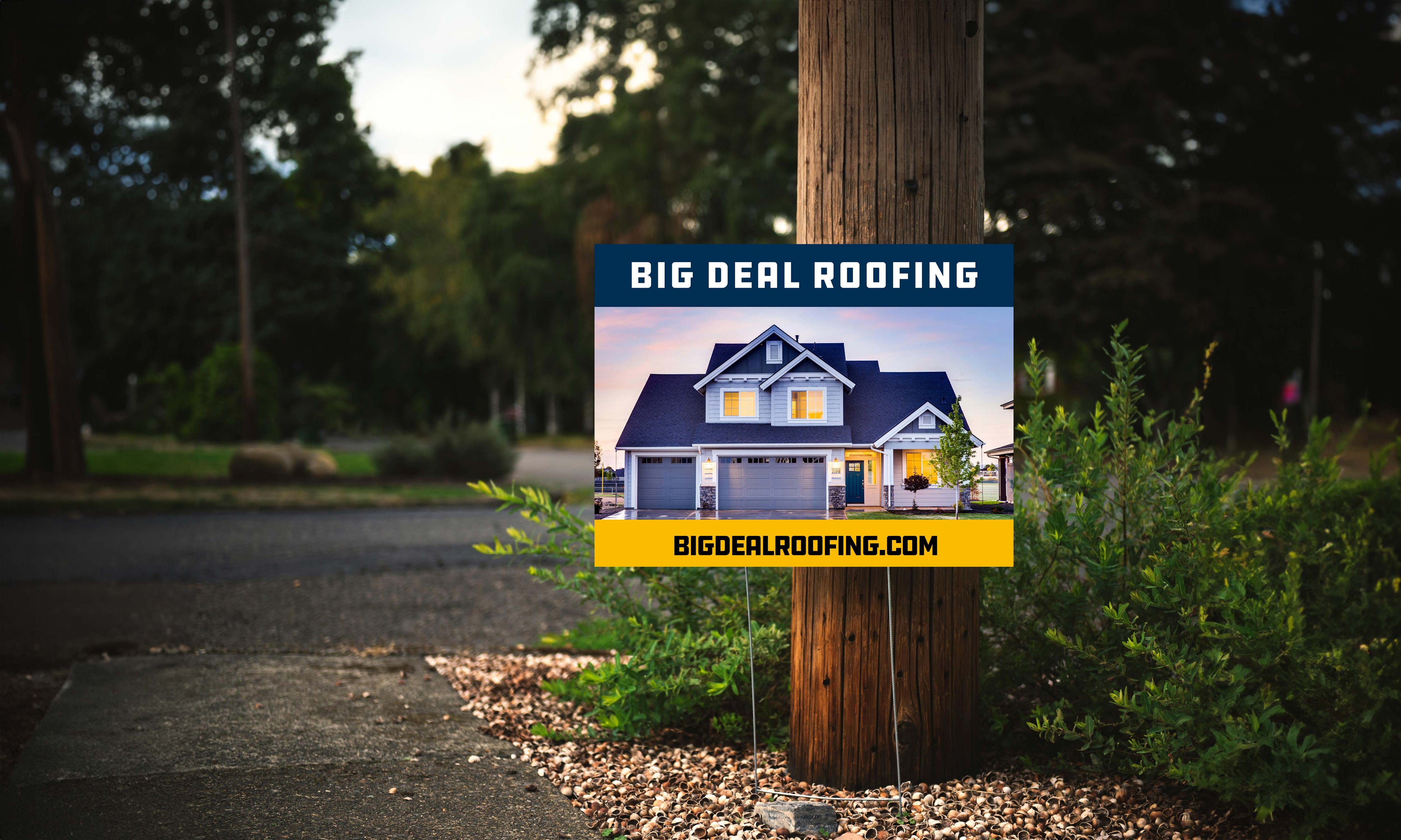 Example of a custom yard sign for BIG DEAL ROOFING, featuring white text on a bold blue background and the company website.