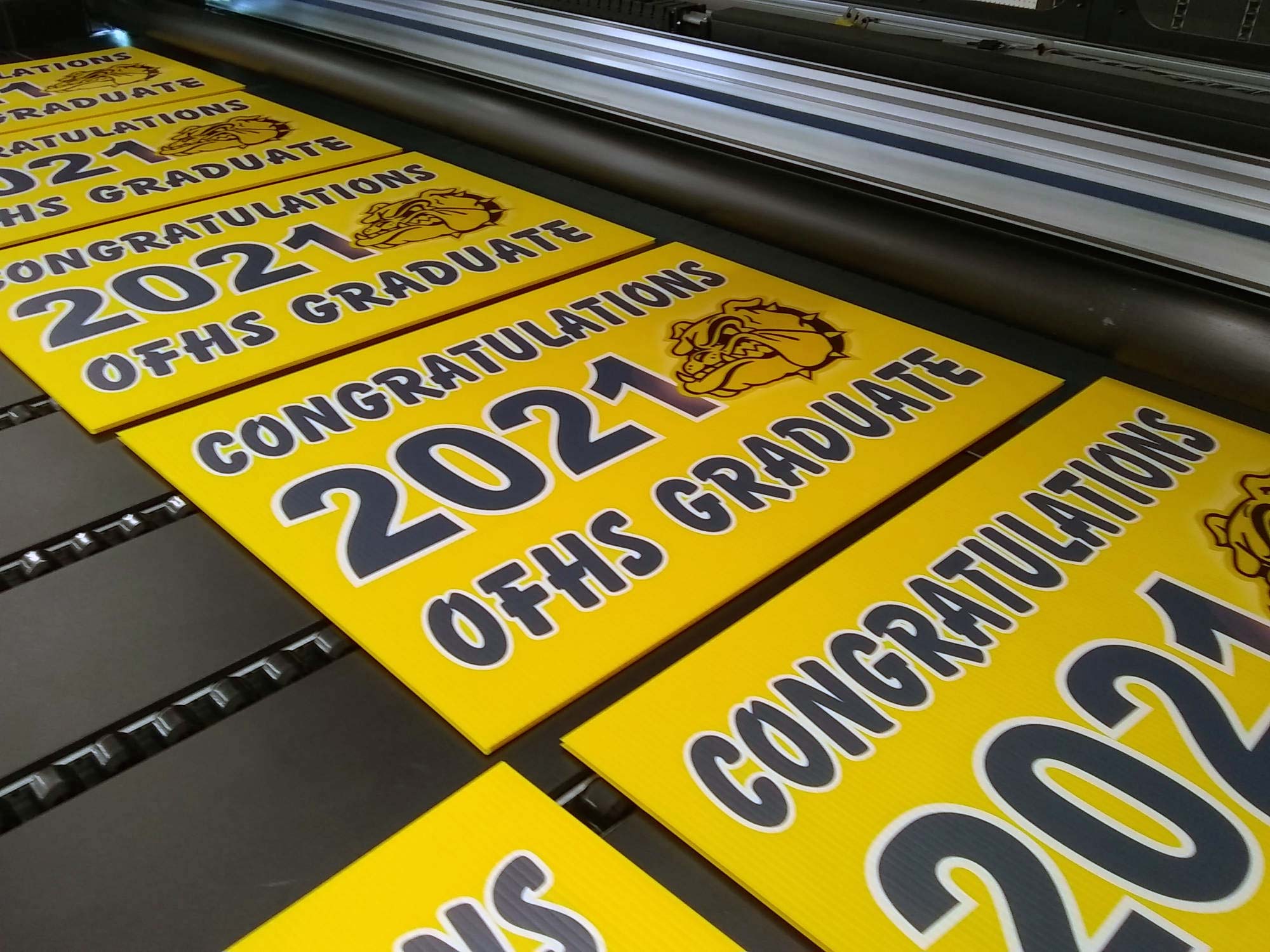 Yellow Coroplast Sign Printed by Cleveland Yard Signs to Congratulate a Graduate.